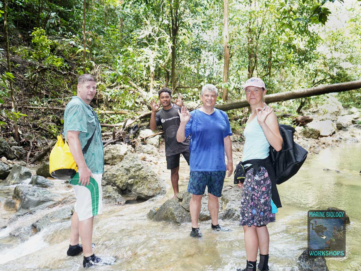 Group in the riverbed at Pulau Batanta